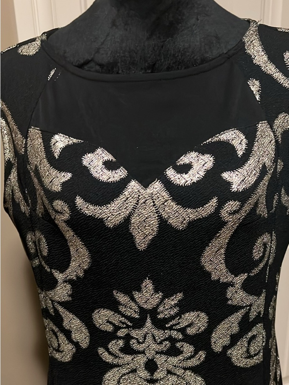 Elegant Black Sleeveless Top with Gold Damask Accents